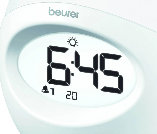 Reloj Despertador con luz de varios colores, cuenta con radio y conexión USB para reproducir música desde el celular Marca Beurer